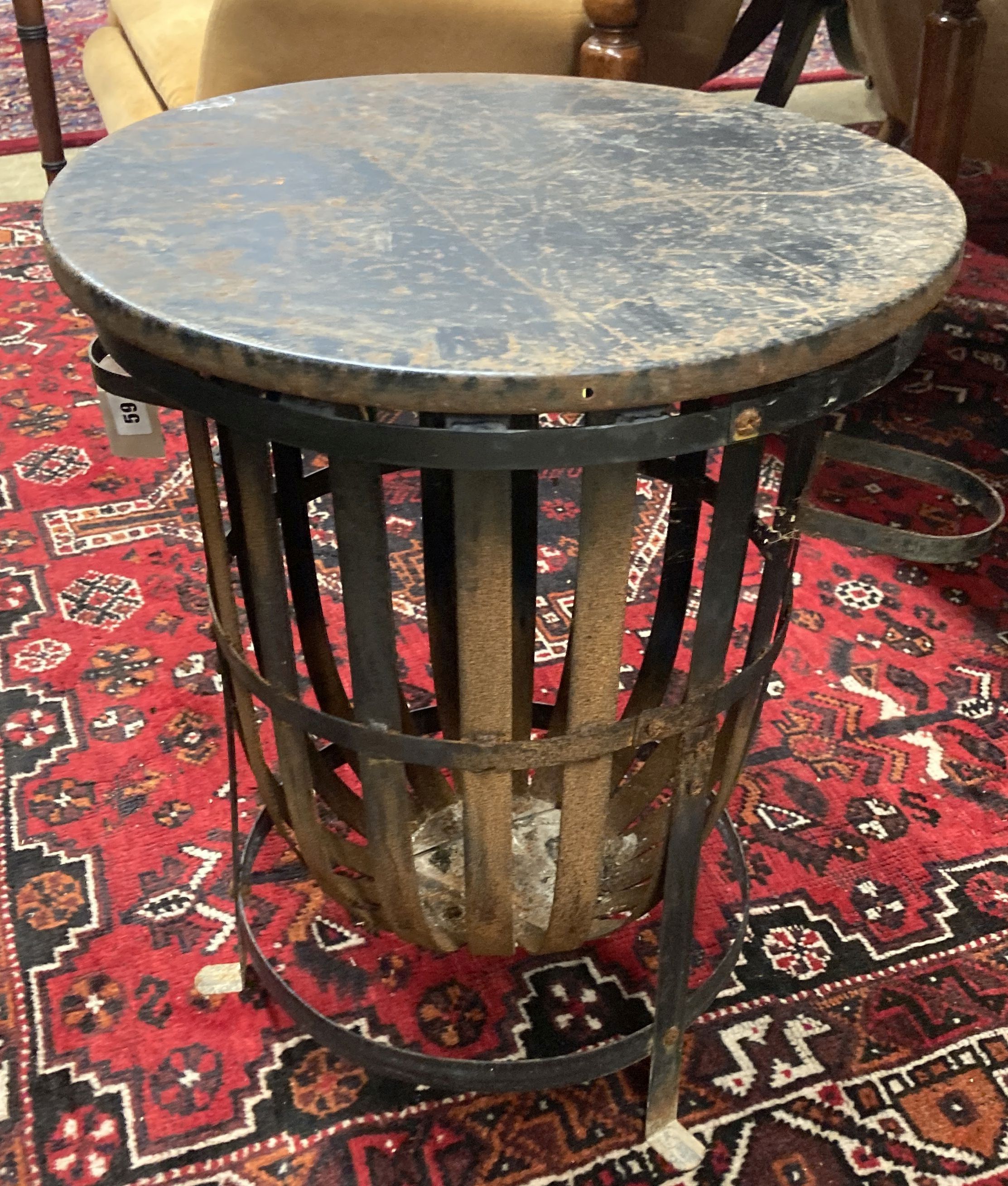 A wrought iron circular brazier, approx. 53cm wide, height 54cm